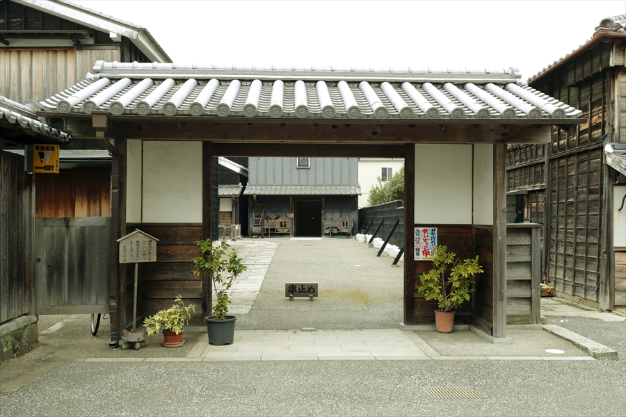 Traditional black-painted warehouse building in Ise-Kawasaki