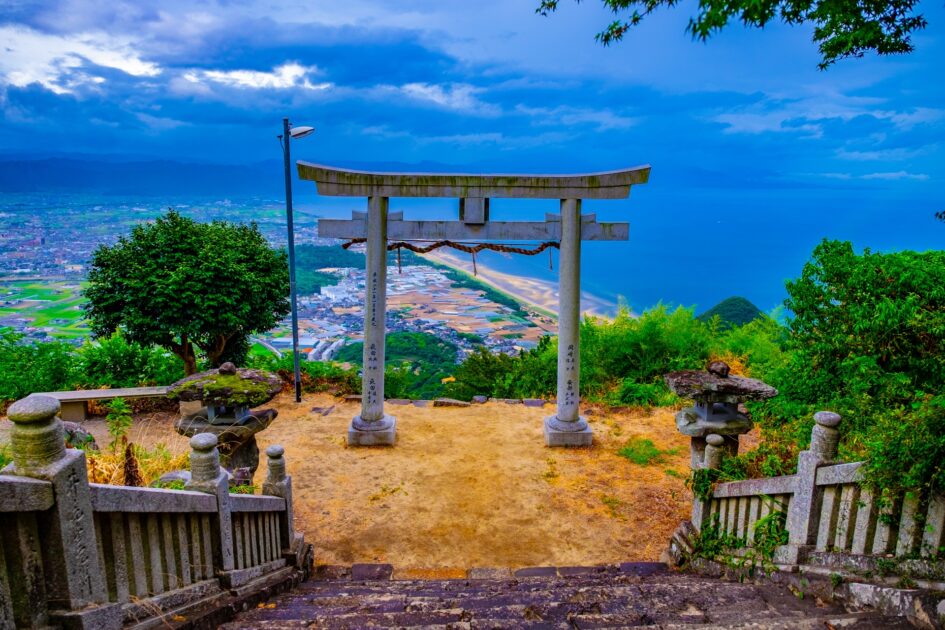 Takaya Shrine torii gate framing panoramic view of Seto Inland Sea and islands