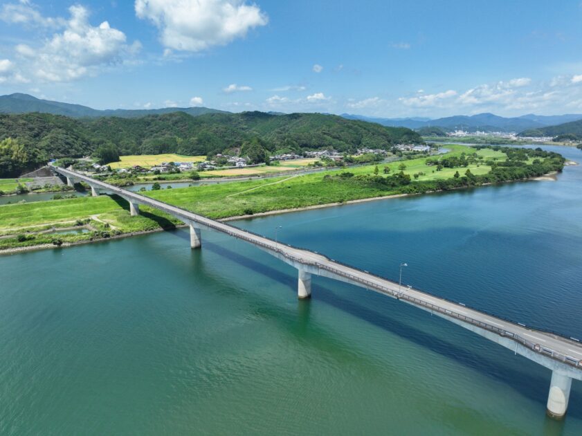 Shimanto Ohashi Bridge spanning across the clear waters of Shimanto River in Kochi Prefecture