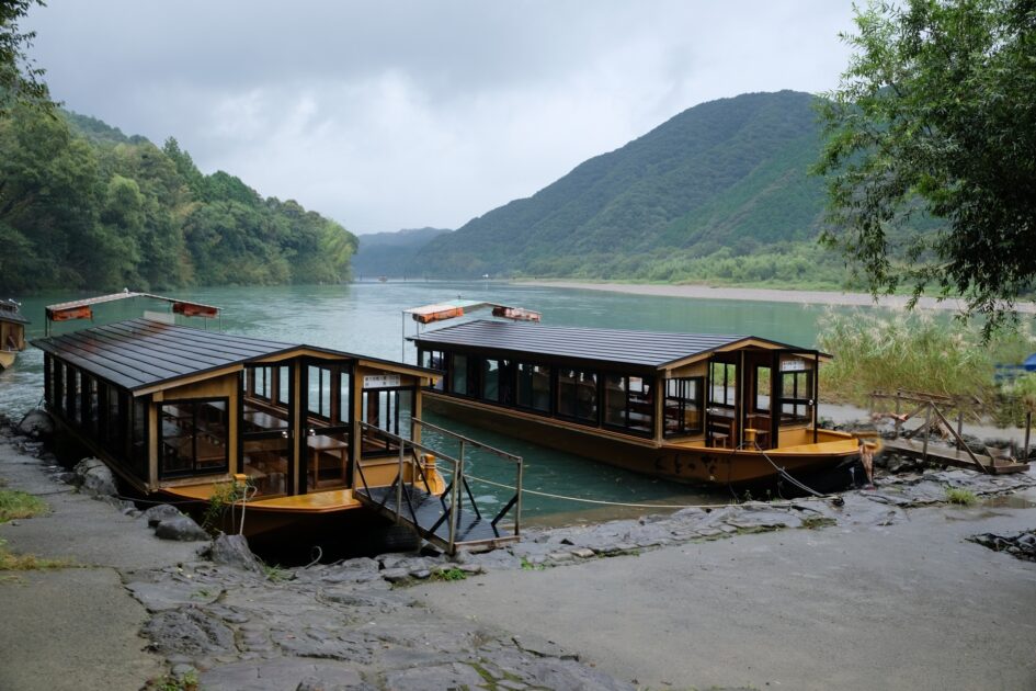 Traditional yakatabune sightseeing boat on a clear river in Kochi